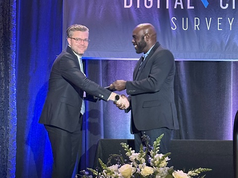 Keshnel Penny (right) receives Digital Cities Award 