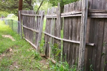 Dilapidated Fence - Fence Code Violation