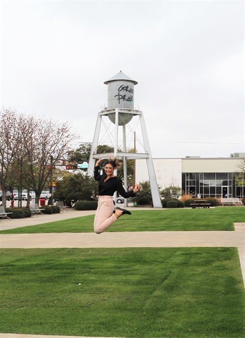 Ari jumping at Farmers Market 